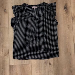 Polka-dot blouse with ruffle cap sleeves & V-neck